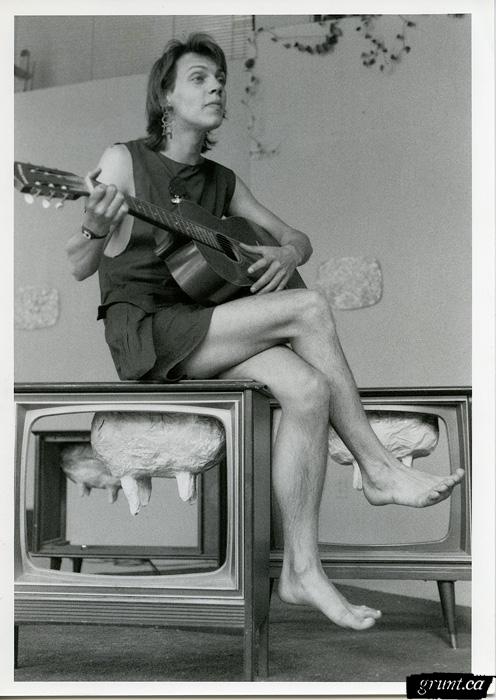 1986 06 24 Sculpture Kempton Dexter Digby County Pasture androgynous figure sitting on sculpture with guitar