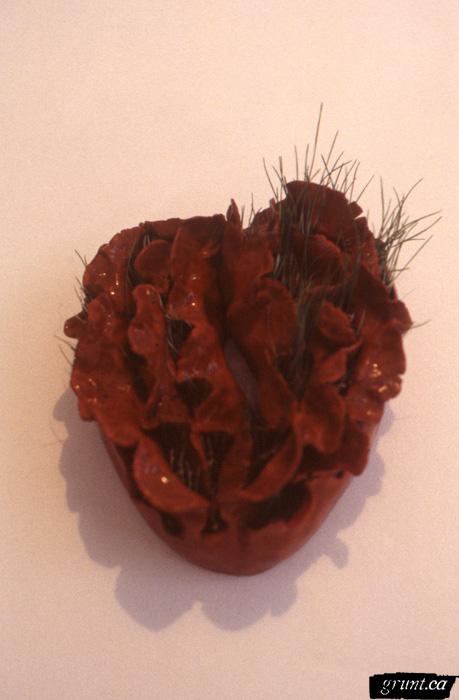 Red heart-like sculpture