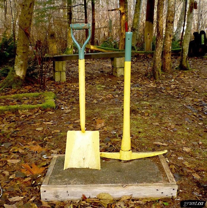 2011 12 Sculpture Yard Work George Sawchuck shovel and pick in box on ground